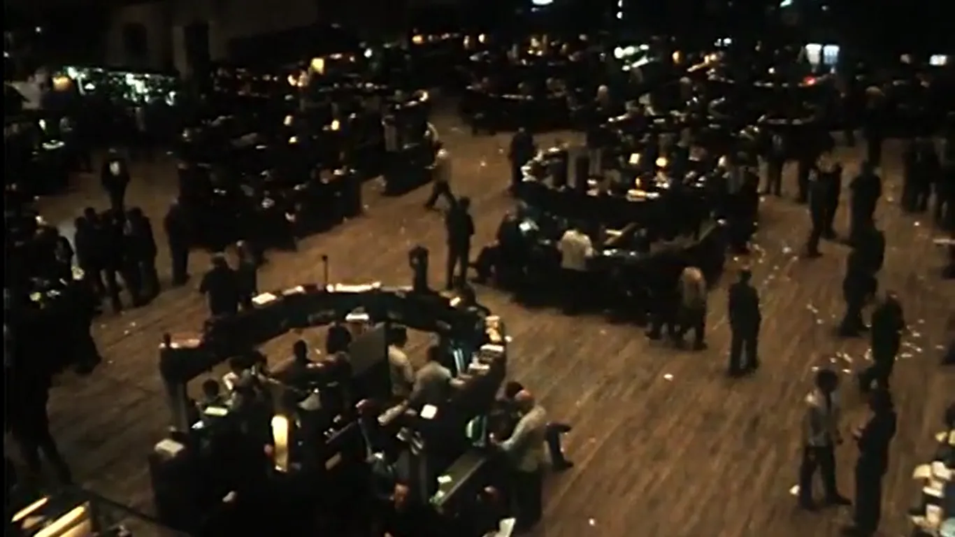 The trading floor of the New York Stock Exchange seen from above, in archive film
